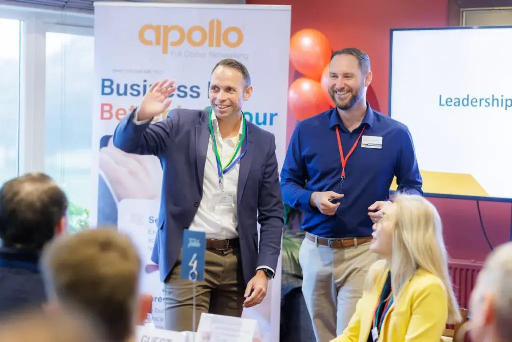 Two speakers presenting at an Apollo networking leadership event